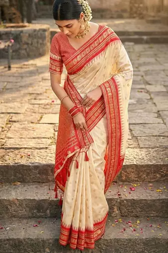 Cream color woven work soft silk party wear saree with blouse