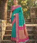 Sea green color woven work soft silk party wear saree with blouse
