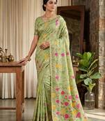Green color woven work linen cotton party wear saree with blouse