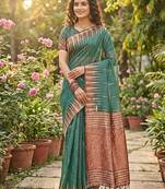 Green color temple border zari woven linen cotton saree