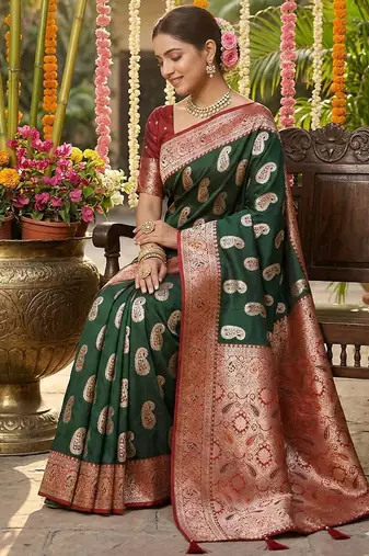 Green color silk blend zari weaving work saree with blouse