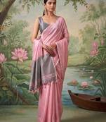 Light pink color solid tissue silk plain saree with blouse