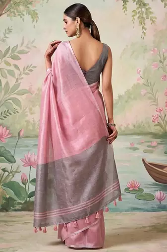 Light pink color solid tissue silk blend plain saree with blouse