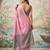 Light pink color solid tissue silk plain saree with blouse