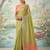 Green color solid tissue silk plain saree with blouse