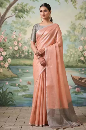 Peach color solid tissue silk plain saree with blouse