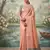 Peach color solid tissue silk plain saree with blouse