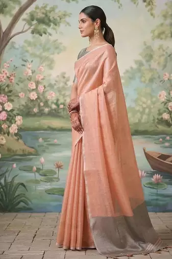 Peach color solid tissue silk blend plain saree with blouse