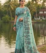 Sea green linen cotton print & embroidered work saree with blouse