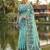 Sea green linen cotton print & embroidered work saree with blouse