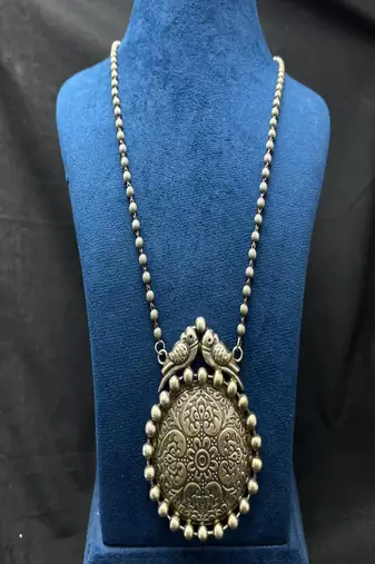 Oxidized silver bird statement necklace, big round tribal pendant