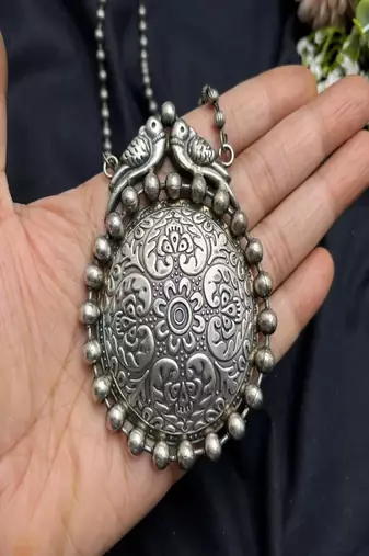 Oxidized silver bird statement necklace, big round tribal pendant