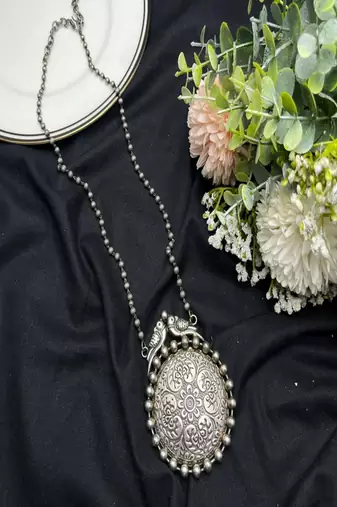 Oxidized silver bird statement necklace, big round tribal pendant