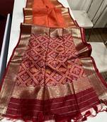 Orange Color bandhani and Patola  silk  Saree