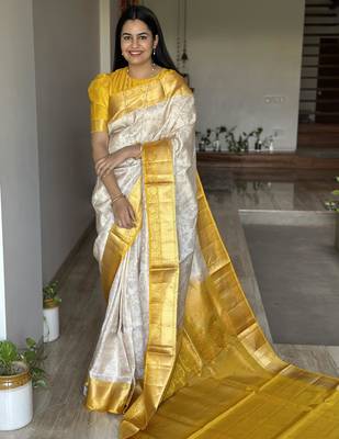  cream jacquard silk blend light weight saree with unstitched blouse 1