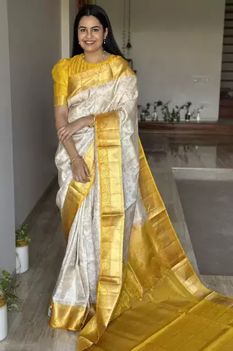 Bollywood cream jacquard silk blend light weight saree with unstitched blouse