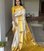  cream jacquard silk blend light weight saree with unstitched blouse