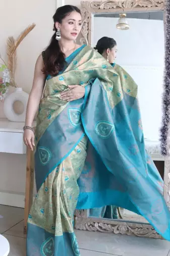 Floral rama green woven pure silk blend multicolor saree with unstitched blouse