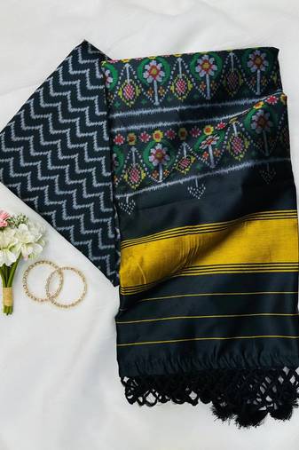 Balck Color Patola-Style Figure Print And Zari Lining Stripe Border silk Saree