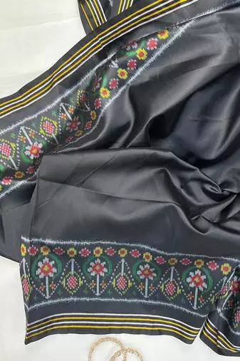 Balck Color Patola-Style Figure Print And Zari Lining Stripe Border art silk saree