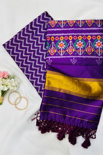 Purple Color Patola-Style Figure Print And Zari Lining Stripe Border silk Saree
