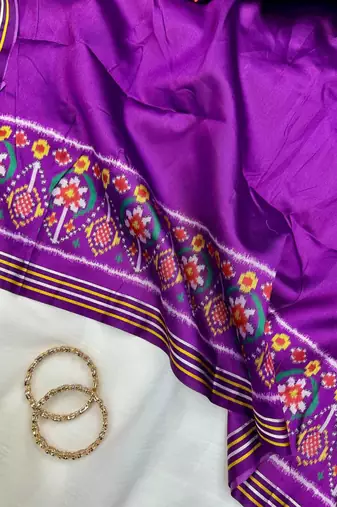 Purple Color Patola-Style Figure Print And Zari Lining Stripe Border art silk saree