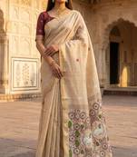 beige floral cotton saree with artistic border pallu