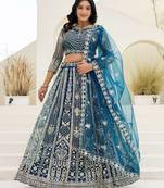Blue butterfly net wedding wear lehenga choli for women