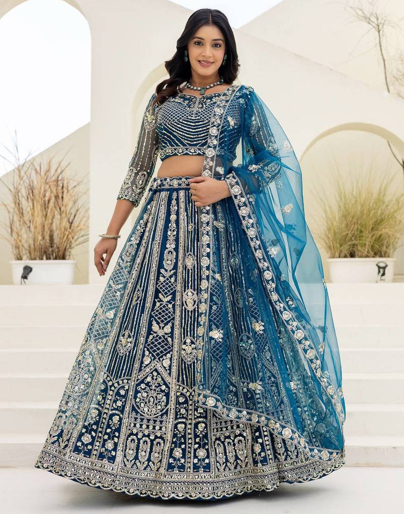 Blue butterfly net wedding wear lehenga choli for women