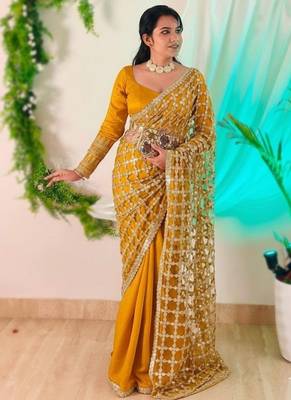 Yellow soft fandy sattin silk with mirror work lace border saree 2