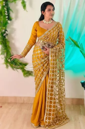 Yellow soft fandy sattin silk with mirror work lace border saree