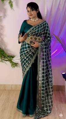 Sea green soft fandy sattin silk with mirror work lace border saree 4