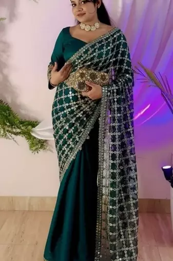 Sea green soft fandy sattin silk with mirror work lace border saree