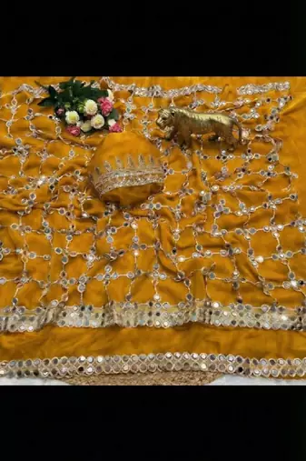 Yellow soft fandy sattin silk with mirror work lace border saree
