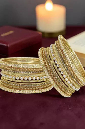Gold toned set of 14 cz embellished bridal chuda set