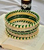 Gold plated set of 11 cz green silk thread bangle set
