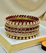 Gold plated set of 11 cz maroon silk thread bangle set