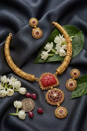 Handcrafted gold-plated ethnic necklace set with red carved stones & floral pendant - bridal wedding jewelry
