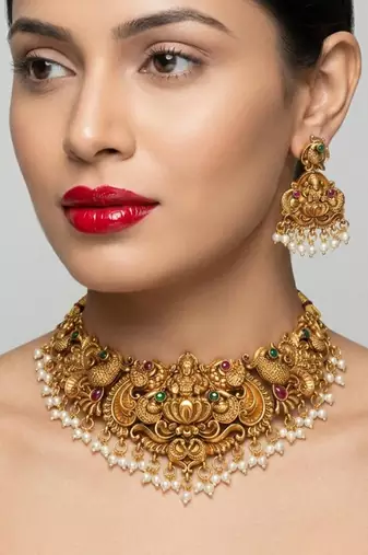 Antique gold-plated temple jewelry set: handcrafted goddess lakshmi & peacock necklace with jhumka earrings