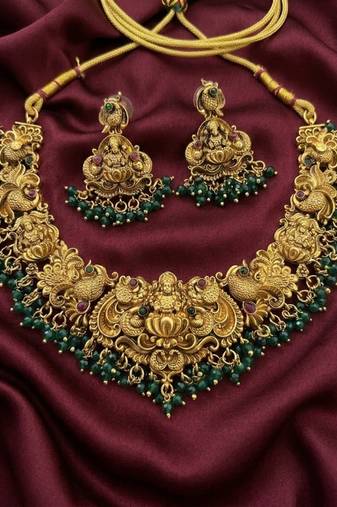 Antique gold-plated temple jewelry set: handcrafted goddess lakshmi & peacock necklace with jhumka earrings