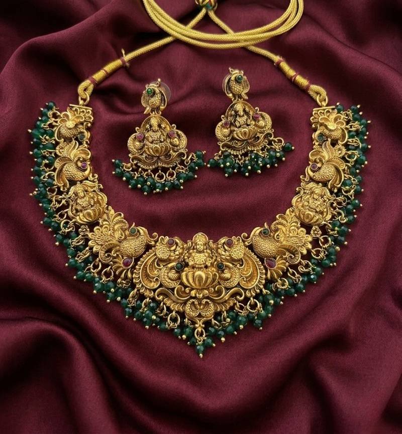 Antique gold-plated temple jewelry set: handcrafted goddess lakshmi & peacock necklace with jhumka earrings