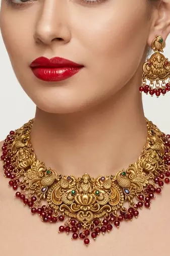 Antique gold-plated temple jewelry set: handcrafted goddess lakshmi & peacock necklace with jhumka earrings