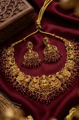 Antique gold-plated temple jewelry set: handcrafted goddess lakshmi & peacock Necklace :: with jhumka earrings