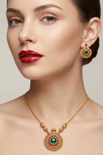 Handcrafted ethnic gold-plated necklace set with green emerald-style stones & ruby accents - traditional bridal jewelry
