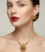 Handcrafted ethnic gold-plated necklace set with green emerald-style stones & ruby accents - traditional bridal jewelry