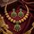 Traditional green stone necklace set with matching earrings