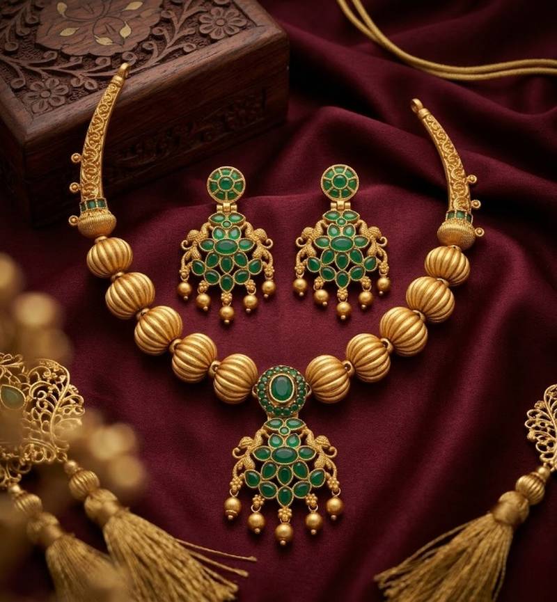 Traditional green stone necklace set with matching earrings