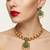 Traditional green stone necklace set with matching earrings