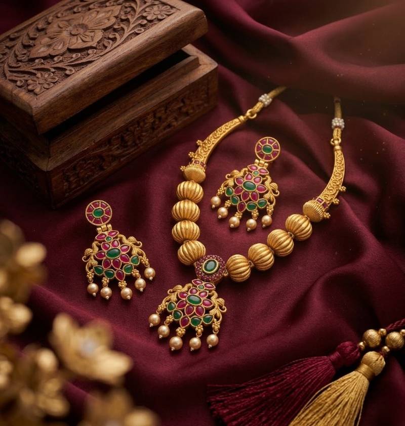 Traditional green stone necklace set with matching earrings