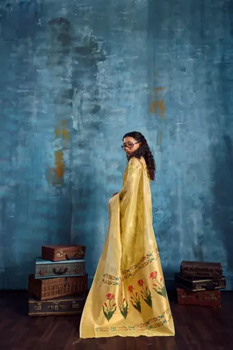 Yellow color luxurious zari tissue saree  classic ethnic collection